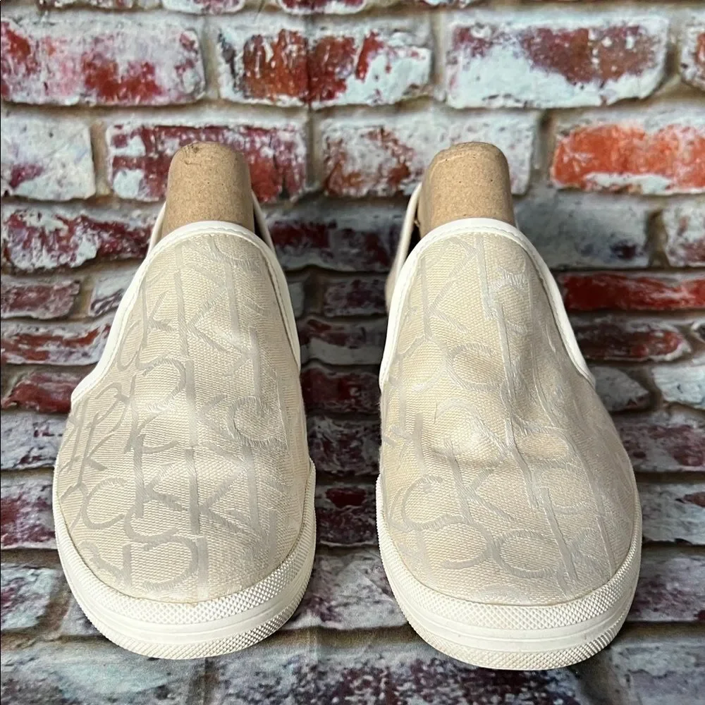 * Calvin Klein Cream Slip-On Sneakers